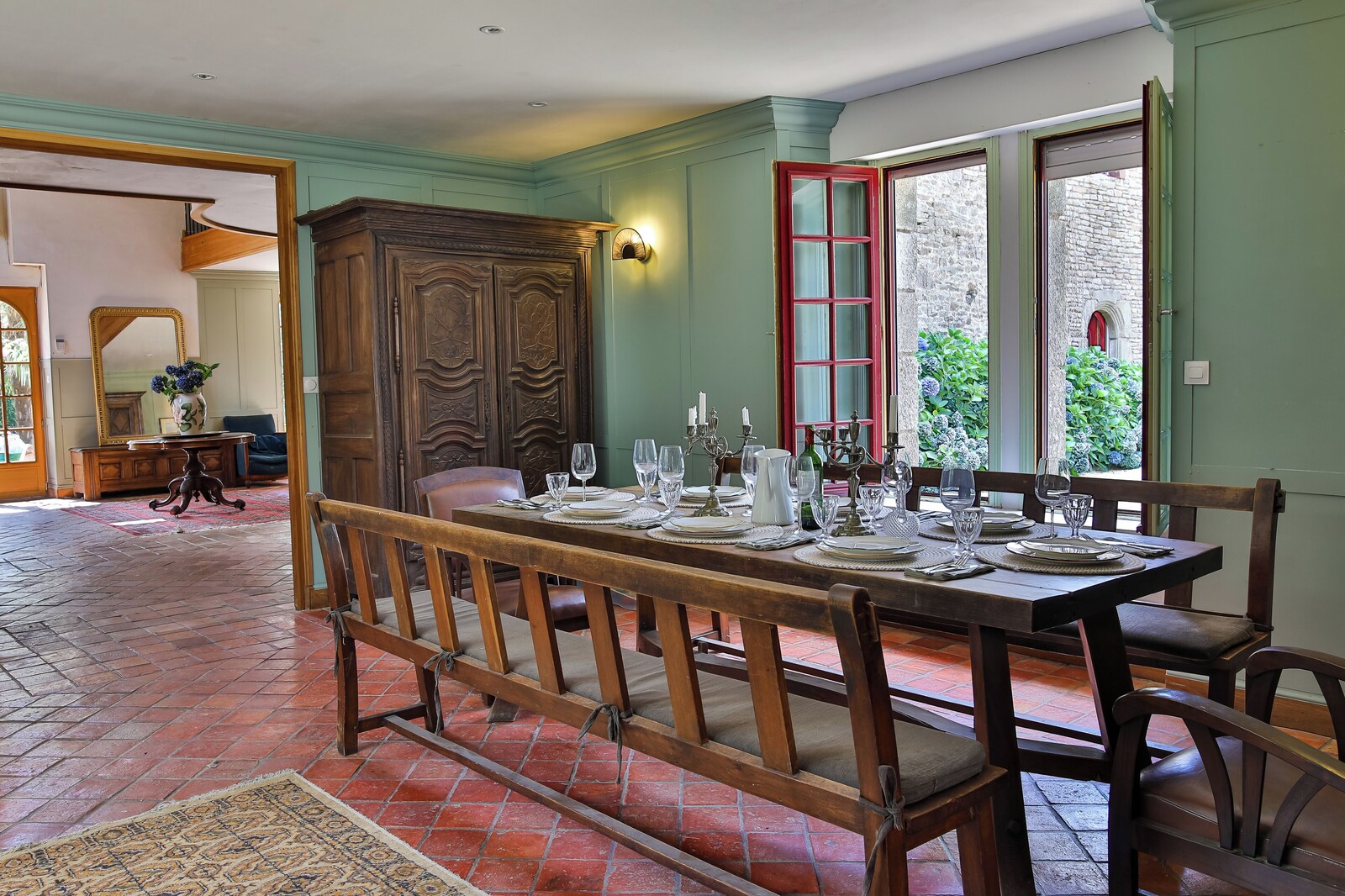 The long dining table at Le Cholo set for a meal