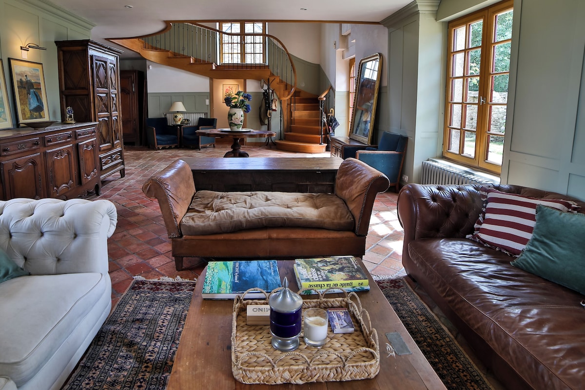 The sitting room and oak staircase
